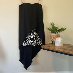 Black asymmetrical shift dress with fitted lace under dress.